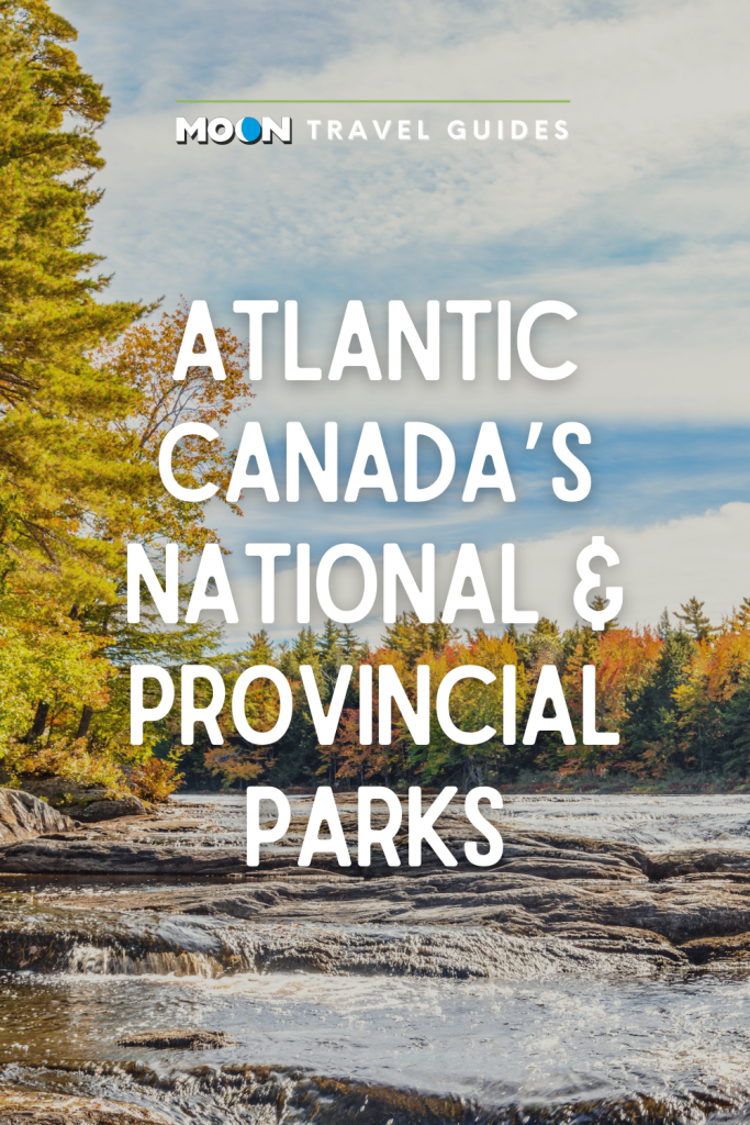 Image of river with fall trees and text Atlantic Canada's National & Provincial Parks