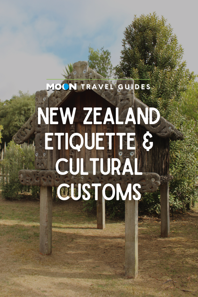 Image of replica Maori house with text New Zealand Etiquette & Cultural Customs