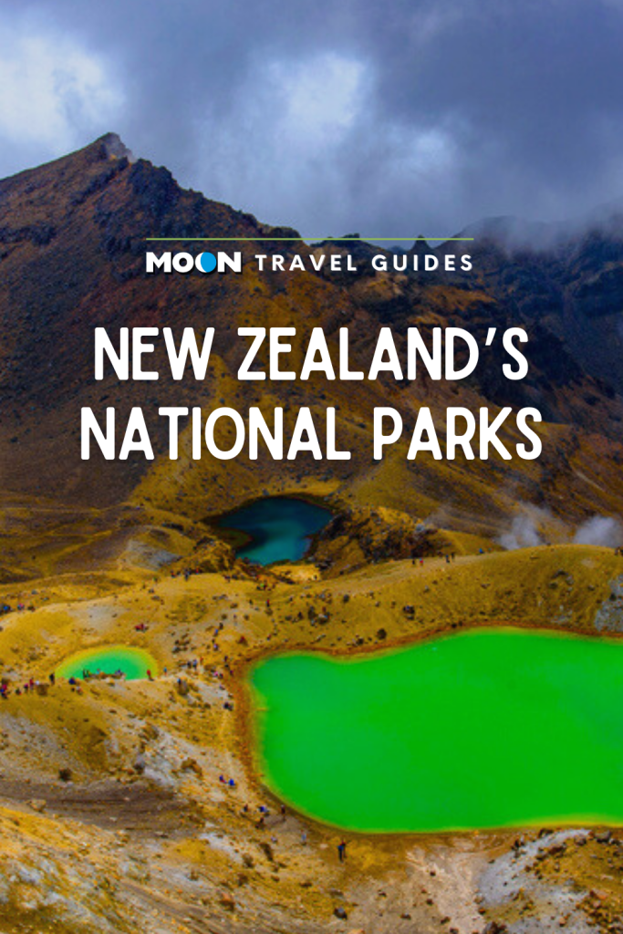 Image of emerald green alpine lake with text New Zealand's National Parks