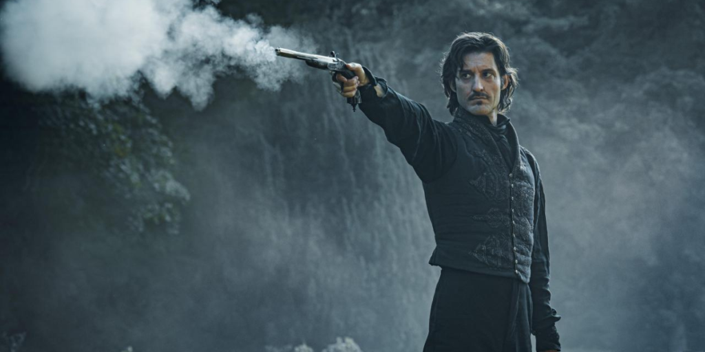 The Count of Monte Cristo movie 2025 man shooting an old fashion gun
